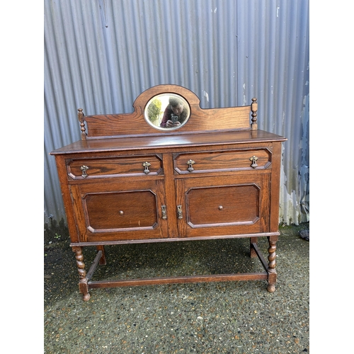 98 - An oak barley twist sideboard 120x44x90