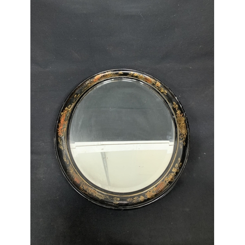 527 - 19th century, Hand painted with Ebony frame, oval mirror, height 59cms