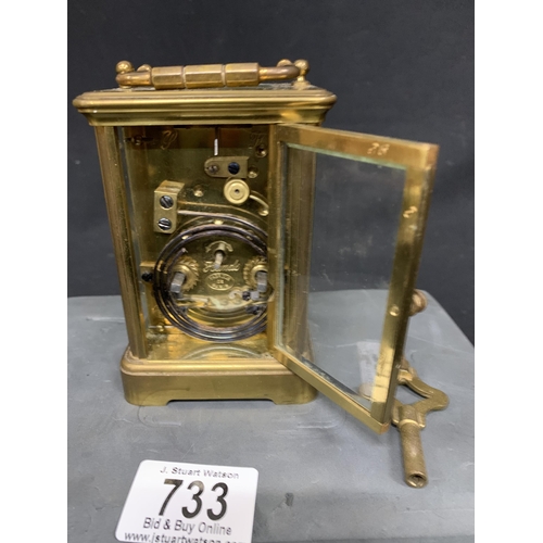 733 - French Brass striking Carriage Clock with key, height 11 cms