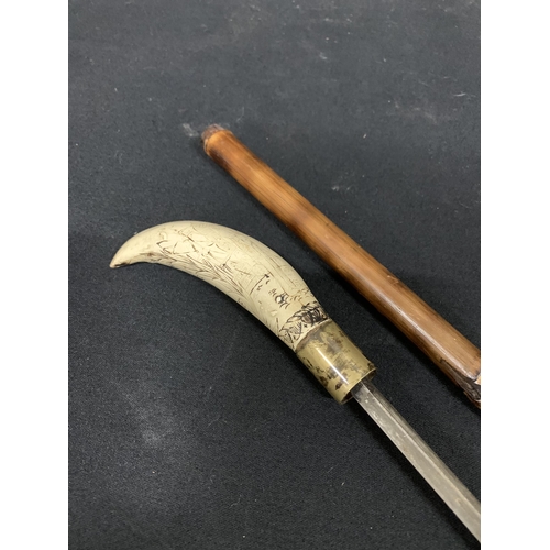 757 - Sword Stick with Engraved reproduction scrimshaw handle