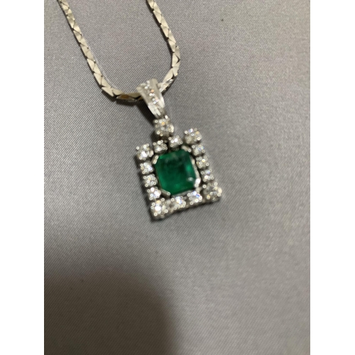 850 - 14ct White Gold Emerald and diamond pendant necklace, suspended on a white chain marked 585, total w... 