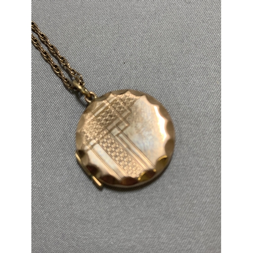 876 - Hallmarked 9ct Gold Locket on 9ct Gold Chain, total gross weight 7.6 gms in presentation box