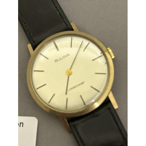 880 - Vintage Gents 9ct Gold Bulova Longchamps Watch on leather strap, in running order