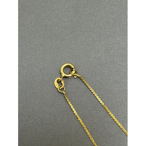 900f - 18ct Gold Pendant Necklace, weight 3 gms