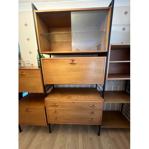 316 - A mid century teak ladderax wall shelving system