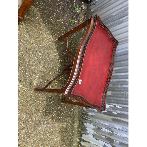 356 - An ornate mahogany occasional table with gallery top 86x46x75