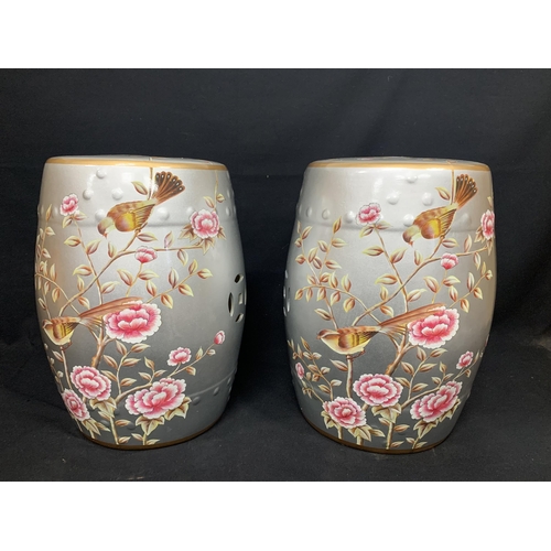 1035 - Pair of Oriental  hand painted garden seats, height 45cms