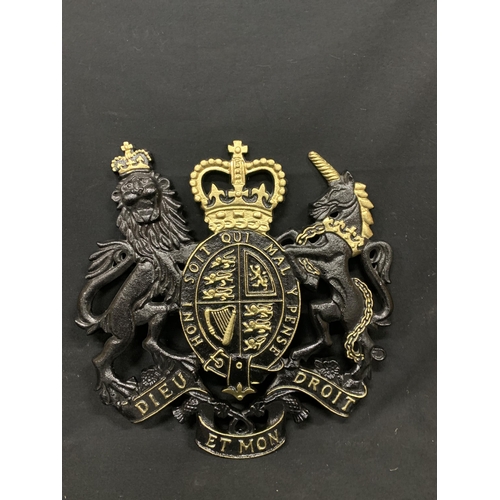 1036 - Cast metal coat of arms , height 49cms