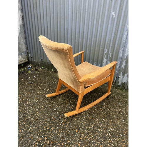 102 - A Parker knoll rocker chair