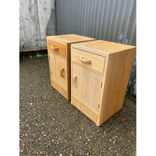 117 - A pair of mid century light oak g plan or similar bedside cupboards