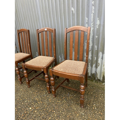 118 - Three 1920's oak dining chairs