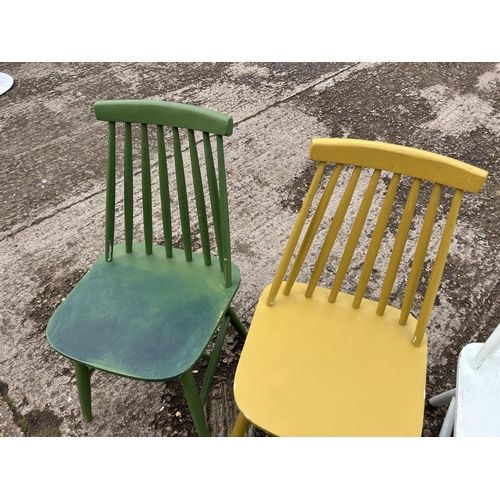 127 - Four painted stick back chairs