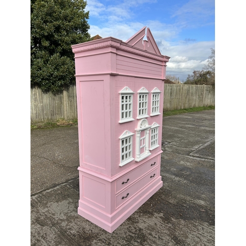 132 - A very large nursery wardrobe, styled as a dolls house 126x40x215