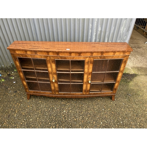 134 - A reproduction mahogany bow front cabinet 150x28x96