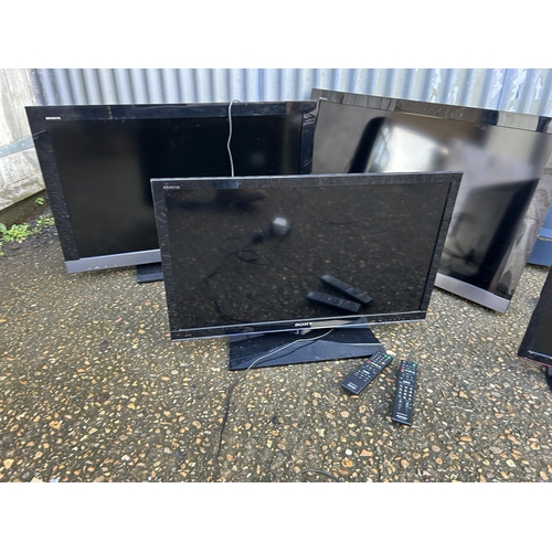 136 - A collection of five assorted flat screen tvs with remotes