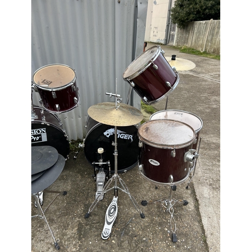 155 - A collective drum set and drum parts, cymbals etc