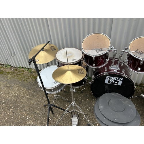 155 - A collective drum set and drum parts, cymbals etc