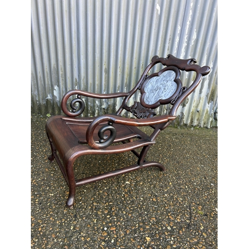 187 - An oriental  hardwood chair with a marble panel back