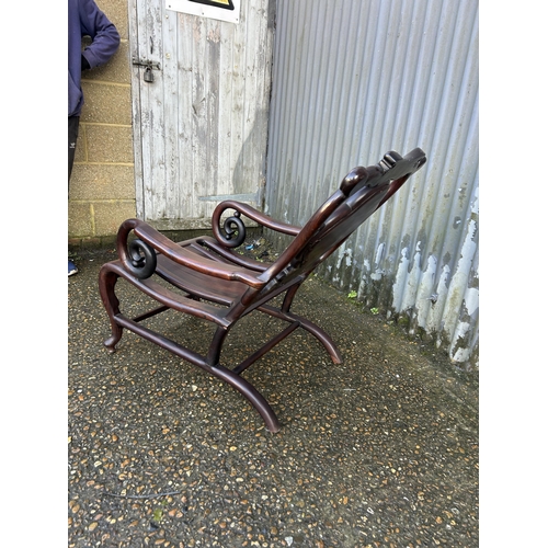 187 - An oriental  hardwood chair with a marble panel back