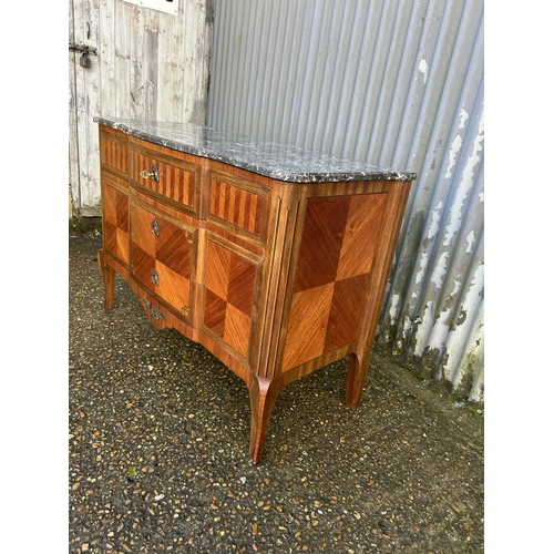 191 - A French kingwood chest of three drawers with grey marble top 120x50x85