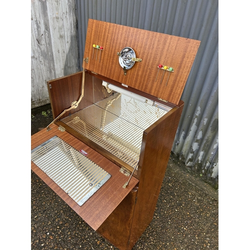 199 - A deco style walnut drinks cabinet 61x30x105