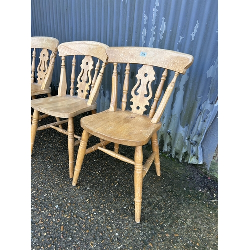 224 - A set of four pine farmhouse dining chairs