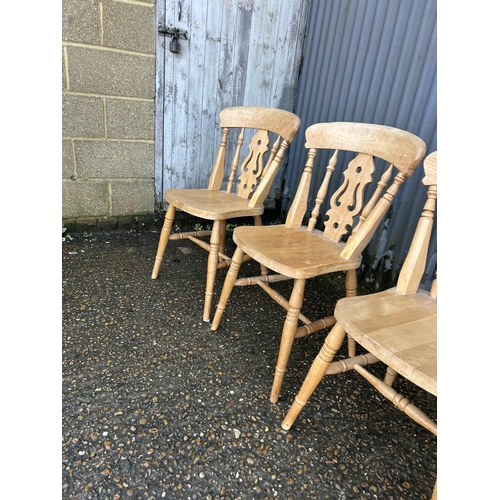 224 - A set of four pine farmhouse dining chairs