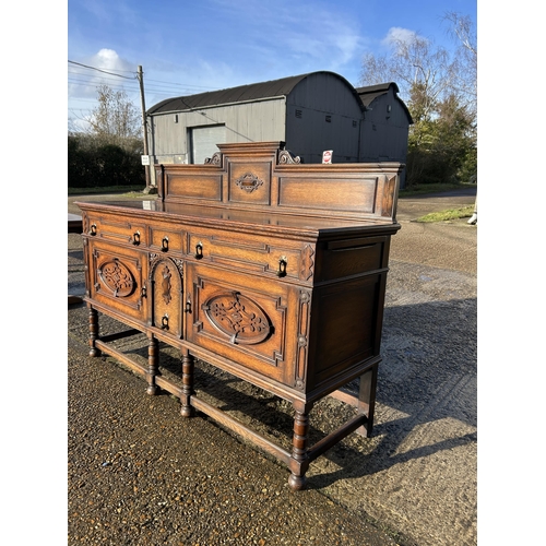 229 - A early 20th century oak sideboard  180x60x100