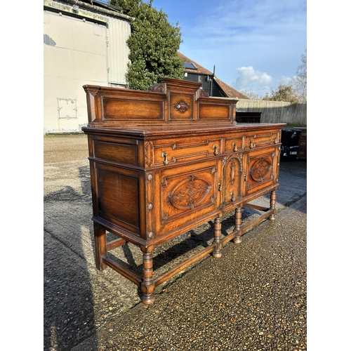 229 - A early 20th century oak sideboard  180x60x100