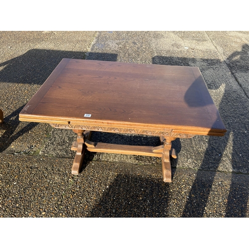 230 - A carved oak drawer leaf table 122x83x77