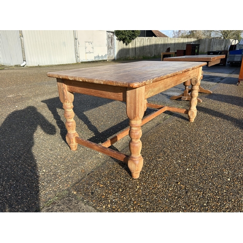 231 - A farmhouse pine dining table  with stretcher base 168x90x77