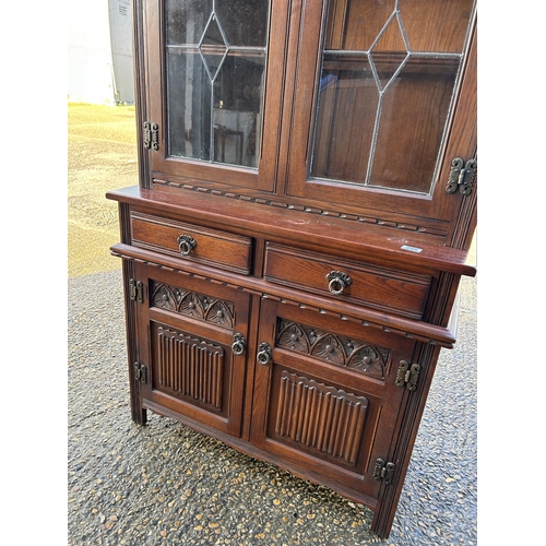 235 - A old charm, leaded  oak bookcase cupboard  93x45 x188