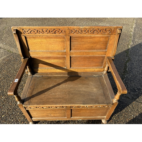 239 - An oak monks bench seat