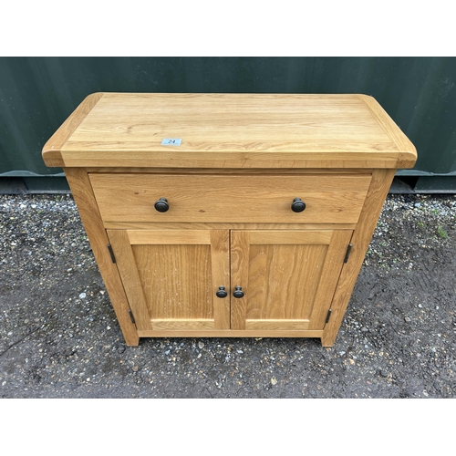 24 - A modern light oak single drawer cupboard 75x33 x75