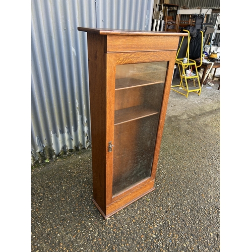 240 - Oak single door cabinet 66x25x140