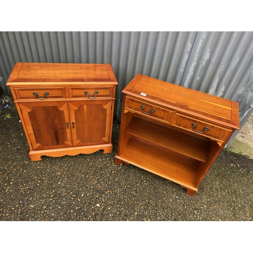 258 - Repro yew two drawer cupboard together with matching two drawer bookcase