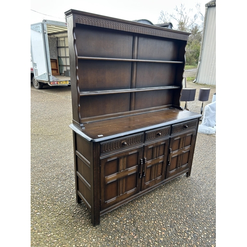 274 - Dark Ercol cottage dresser 152cm wide