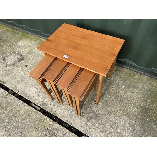 315 - A Danish style teak nest of five tables