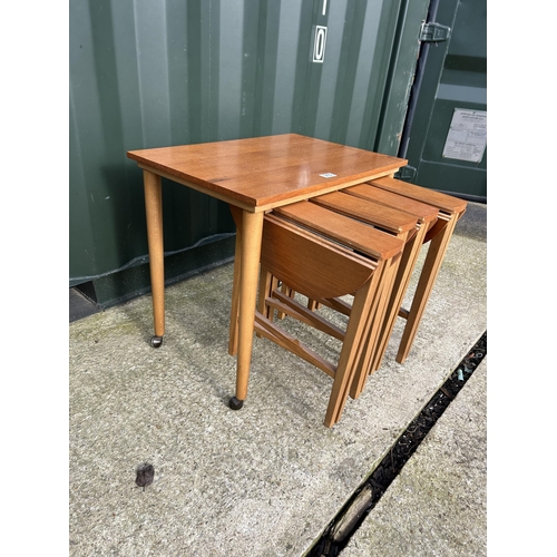 315 - A Danish style teak nest of five tables