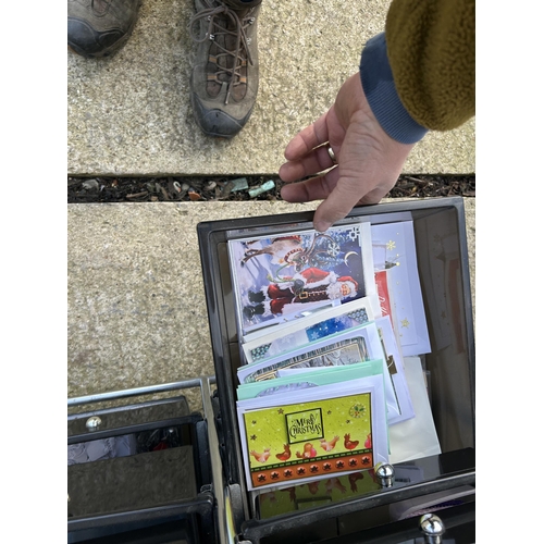 343 - A stainless steel crafting trolley loaded with stationery etc