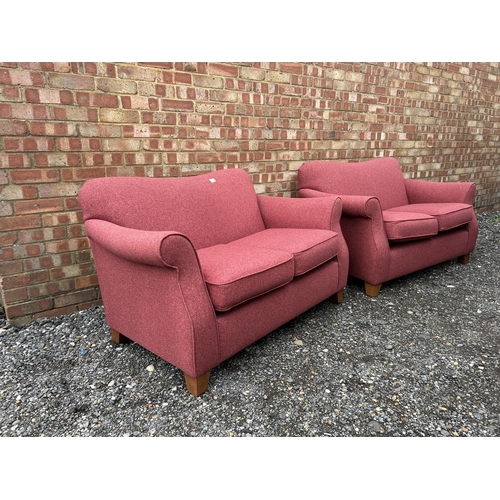 362 - A pair of modern red upholstered two seater sofas from NEXT