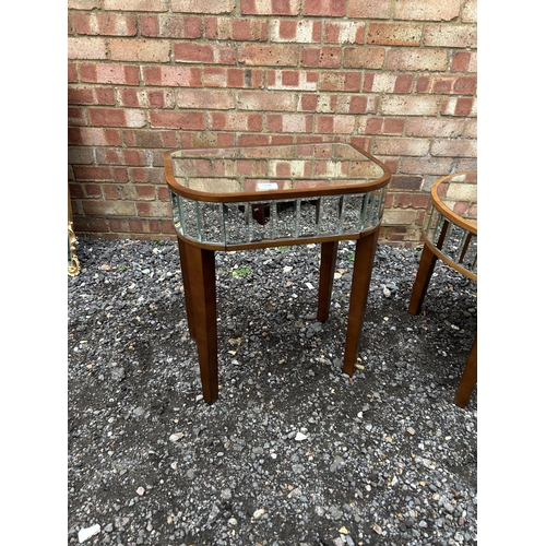 379 - A modern mirror glass coffee table together with matching side table