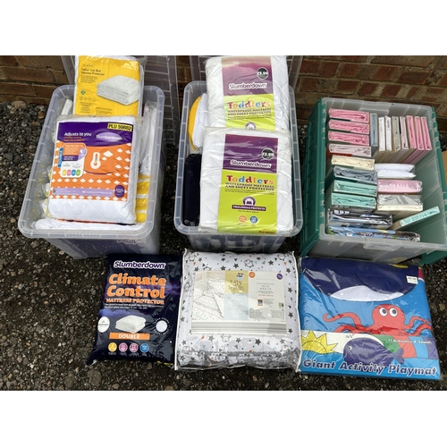 394 - Five boxes of assorted new children's and baby bedding and accessories together with giant play mat