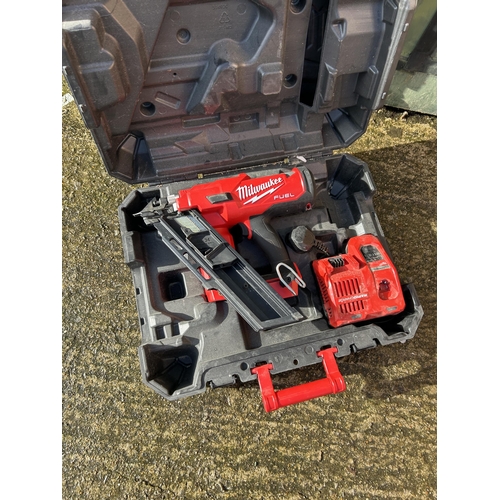 467 - A cased MILWAUKEE NAIL GUN WITH CHARGER