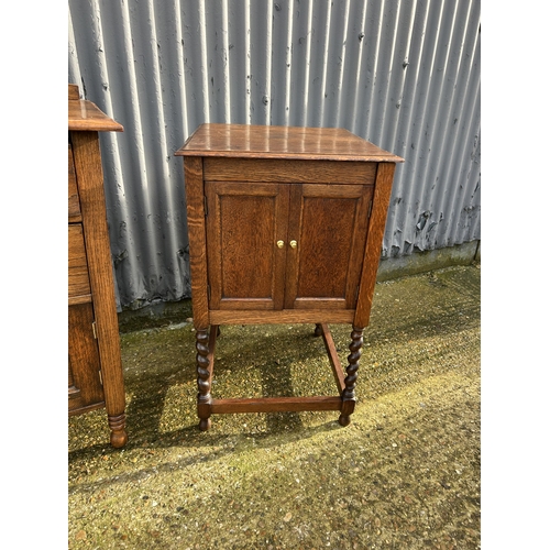 53 - An oak two drawer washstand together with a barley twist cupboard