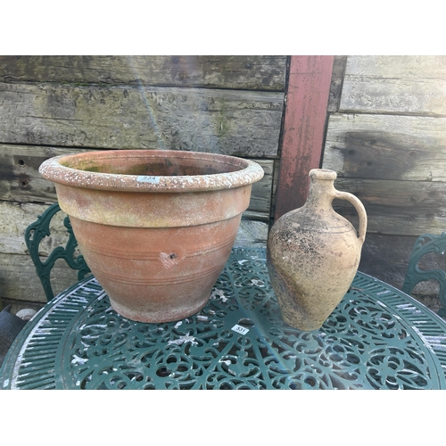 534 - A large terracotta pot and a terracotta urn