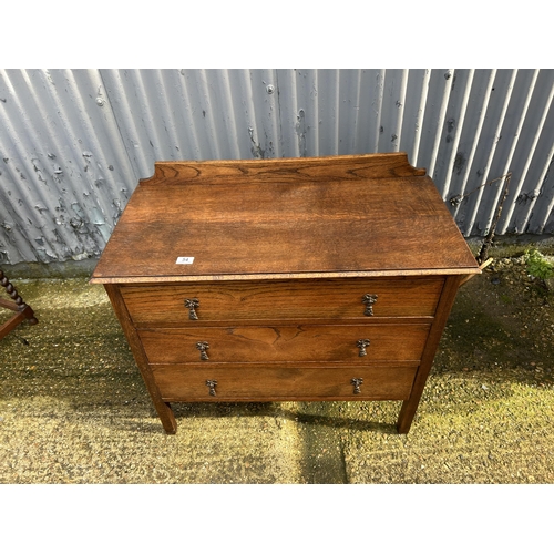 54 - An oak chest of three drawers 88x44x74