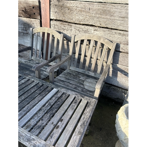 542 - A good quality hardwood drinks table and two chairs