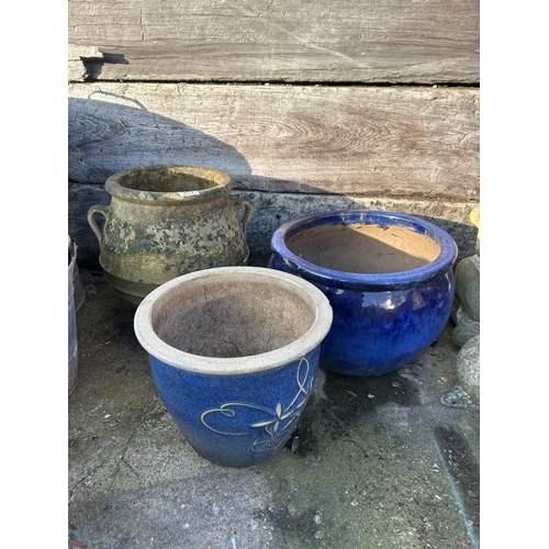 545 - Terracotta urn and two glazed pots