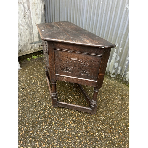 89 - An antique oak credence cupboard 134x56x90